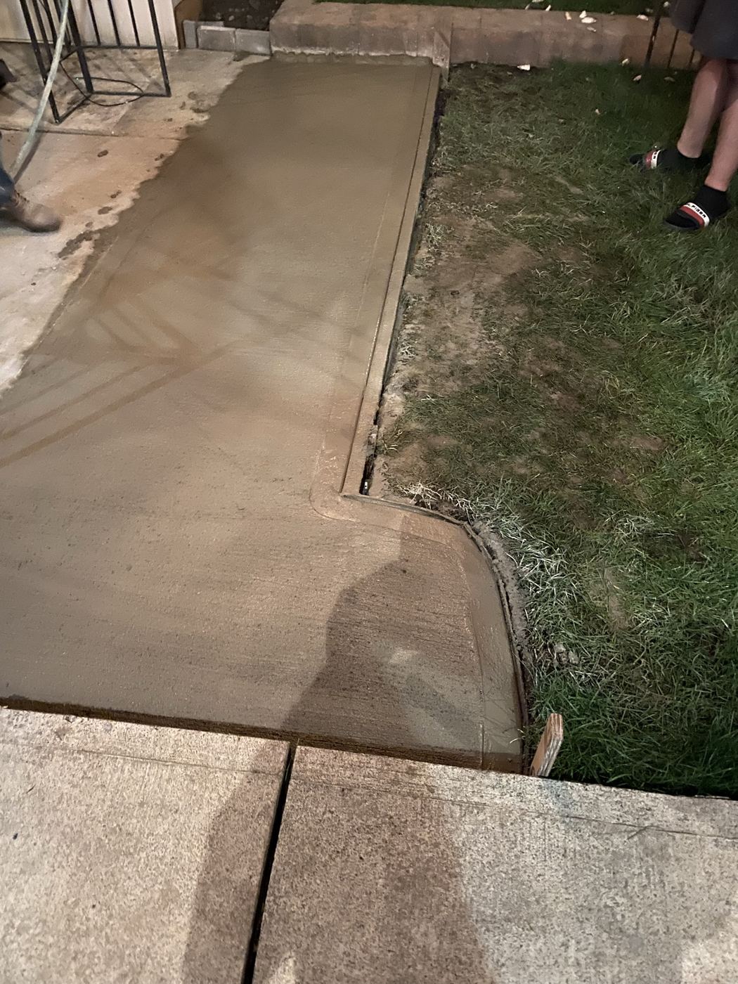 Concrete walkway being poured